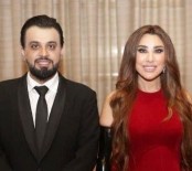 كم فارق العمر بين نجوى كرم وزوحها عمر الدهماني